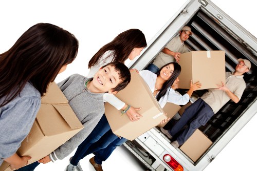 Office relocation planning with moving boxes and workspace setup