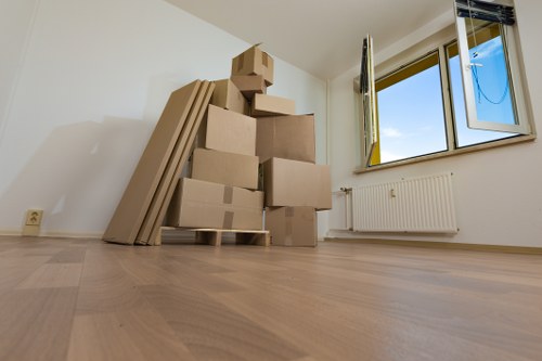 Person using a keyboard to access Removals Uk services information
