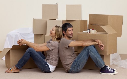 Packed moving boxes ready for a flat removals service
