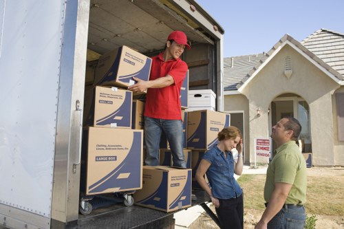 Professional removals team loading household items in the UK