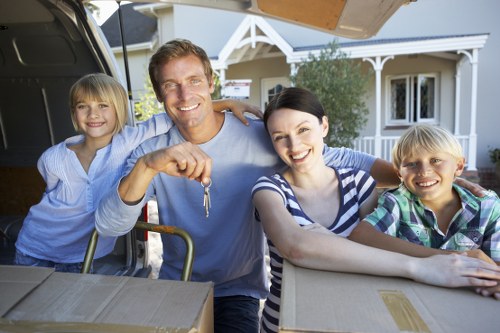 Eco-friendly furniture pick-up vehicle collecting mixed bulky items in the UK