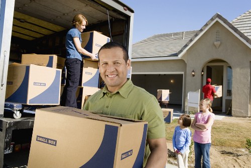 Packed home items organized for a removals process in the UK